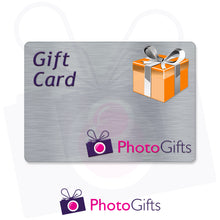 Load image into Gallery viewer, Grey card with the writing Gift Card and Photogifts Logo as well as a picture of a gold wrapped box