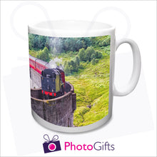 Load image into Gallery viewer, Our cheapest photo mug showing a photo of a steam train crossing a viaduct