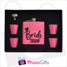 Load image into Gallery viewer, Open boxed gift set of a pink hip flask with silver funnel and four matching shot glasses. Hip flask has the words Bride Squad personalised on the flask. Flask set as produced by Photogifts.co.uk
