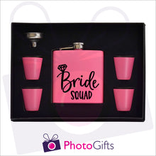 Load image into Gallery viewer, Open boxed gift set of a pink hip flask with silver funnel and four matching shot glasses. Hip flask has the words Bride Squad personalised on the flask. Flask set as produced by Photogifts.co.uk