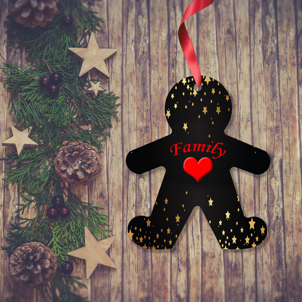 Dark wooden background with a Christmas Garland stretched out on the Left hand side from top to bottom. On the garland are some wooden strs and fir cones along with some dark red berries. To the right of the garland is a Christmas Decoration in the shape of a gingerbread man with a red ribbon. The decoration is mainly black with golden stars over the head and leg and feet area. In the centre is a red heart with the word family above. Decoration as supplied by Photogifts.co.uk