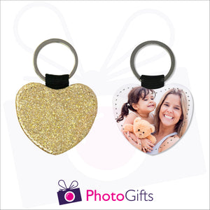 Front and back image of a heart shaped keyring. On one side the heart is all gold glitter and on the other is a photo of a mother holding a toddler and teddy bear in her arms. There is also the Photogifts Logo. Keyring as produced by Photogifts.co.uk