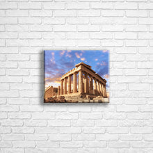 Load image into Gallery viewer, Personalised 10x8" landscape border canvas with your own choice of image hung on a white brick wall by Photogifts.co.uk