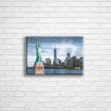 Load image into Gallery viewer, Personalised 12x8&quot; Landscape wrapped canvas with your own choice of image hung on a white brick wall by Photogifts.co.uk
