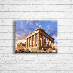 Personalised 16x12" landscape border canvas with your own choice of image hung on a white brick wall by Photogifts.co.uk