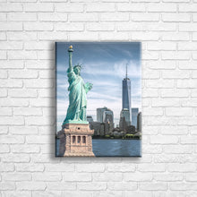 Load image into Gallery viewer, Personalised 16x12" portrait wrapped canvas with your own choice of image hung on a white brick wall by Photogifts.co.uk