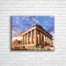 Load image into Gallery viewer, Personalised 20x16&quot; landscape border canvas with your own choice of image hung on a white brick wall by Photogifts.co.uk
