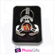 Load image into Gallery viewer, Anchor style fidget spinner on keyring in gift tin as supplied by Photogifts.co.uk. Your choice of image is printed on the middle part of the spinner.