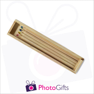 Small wooden personalised pencil case with top removed with your choice of image on the top as produced by Photogifts.co.uk