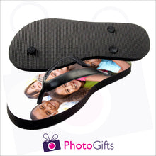 Load image into Gallery viewer, Image of top and bottom of Large kids sized personalised flip-flops with your own choice of image as produced by Photogifts.co.uk
