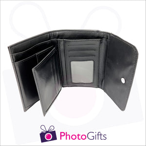 Inside detail of ladies personalised black faux leather wallet showing the credit card slots as well as the main compartment for notes and the window section for drivers licence or id as produced by Photogifts.co.uk