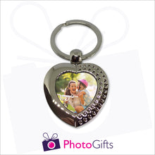Load image into Gallery viewer, Metal pendant keyring in the shape of a heart with small rhinestones on edge of heart. Your own choice of image is in the centre as produced by Photogifts.co.uk