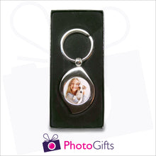 Load image into Gallery viewer, Personalised metal leaf shaped keyring in presentation box with your own choice of image in the centre as produced by Photogifts.co.uk