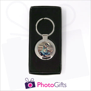 Round metal pendant keyring in presentation box with your own choice of image in the centre as produced by Photogifts.co.uk