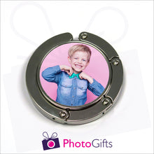 Load image into Gallery viewer, Bag hanger in round shape fully closed with your own choice of image in the centre as produced by Photogifts.co.uk
