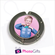 Load image into Gallery viewer, Bag hanger in round shape fully closed with your own choice of image in the centre as produced by Photogifts.co.uk