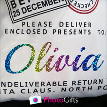 Load image into Gallery viewer, Close up of the bag showing the sparkly letters Olivia as produced by Photogifts.co.uk
