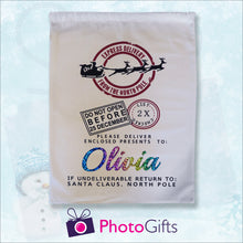 Load image into Gallery viewer, Blue snowy background with snowman with large white sack with the words "Express delivery from the north pole DO not open before 25 December Please delivery enclosed presents to Olivia if undelivered return to Santa Claus North Pole" by Photogifts.co.uk