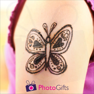 Temporary tattoo as shown on an arm as produced by Photogifts.co.uk