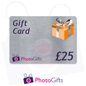 Grey £25 gift card with the writing Gift Card and Photogifts Logo as well as a picture of a gold wrapped box