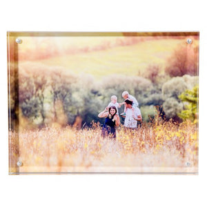 Acrylic block with the picture of a family walking in a field as supplied by Photogifts.co.uk