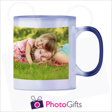 Load image into Gallery viewer, 10oz blue colour change mug that has been personalised with your own choice of image in its fully hot stage as produced by Photogifts.co.uk
