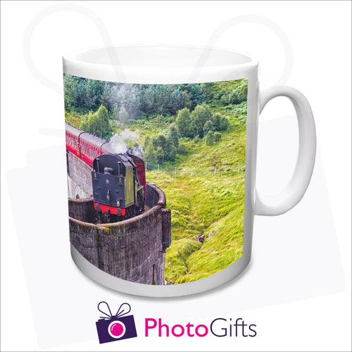 Our cheapest photo mug showing a photo of a steam train crossing a viaduct