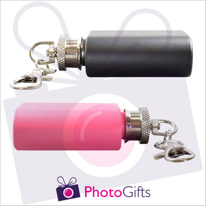 Side view of two mini hip flasks, one pink one black, on keyrings as produced by Photogifts.co.uk