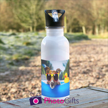 Load image into Gallery viewer, White 600ml sports water bottle on table as supplied by Photogifts.co.uk
