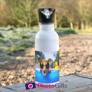 White 600ml sports water bottle on table as supplied by Photogifts.co.uk