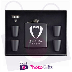Open boxed gift set of a black hip flask with silver funnel and four matching shot glasses. Hip flask has picture of bowtie and dress shirt along with the words Best Man and a date personalised on the flask. Flask set as produced by Photogifts.co.uk