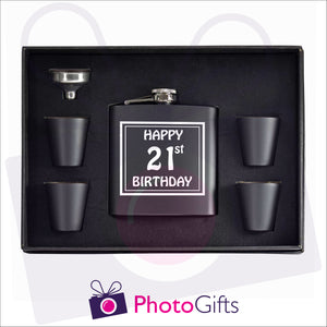 Open boxed gift set of a black hip flask with silver funnel and four matching shot glasses. Hip flask has the words Happy 21st Birthday personalised on the flask. Flask set as produced by Photogifts.co.uk
