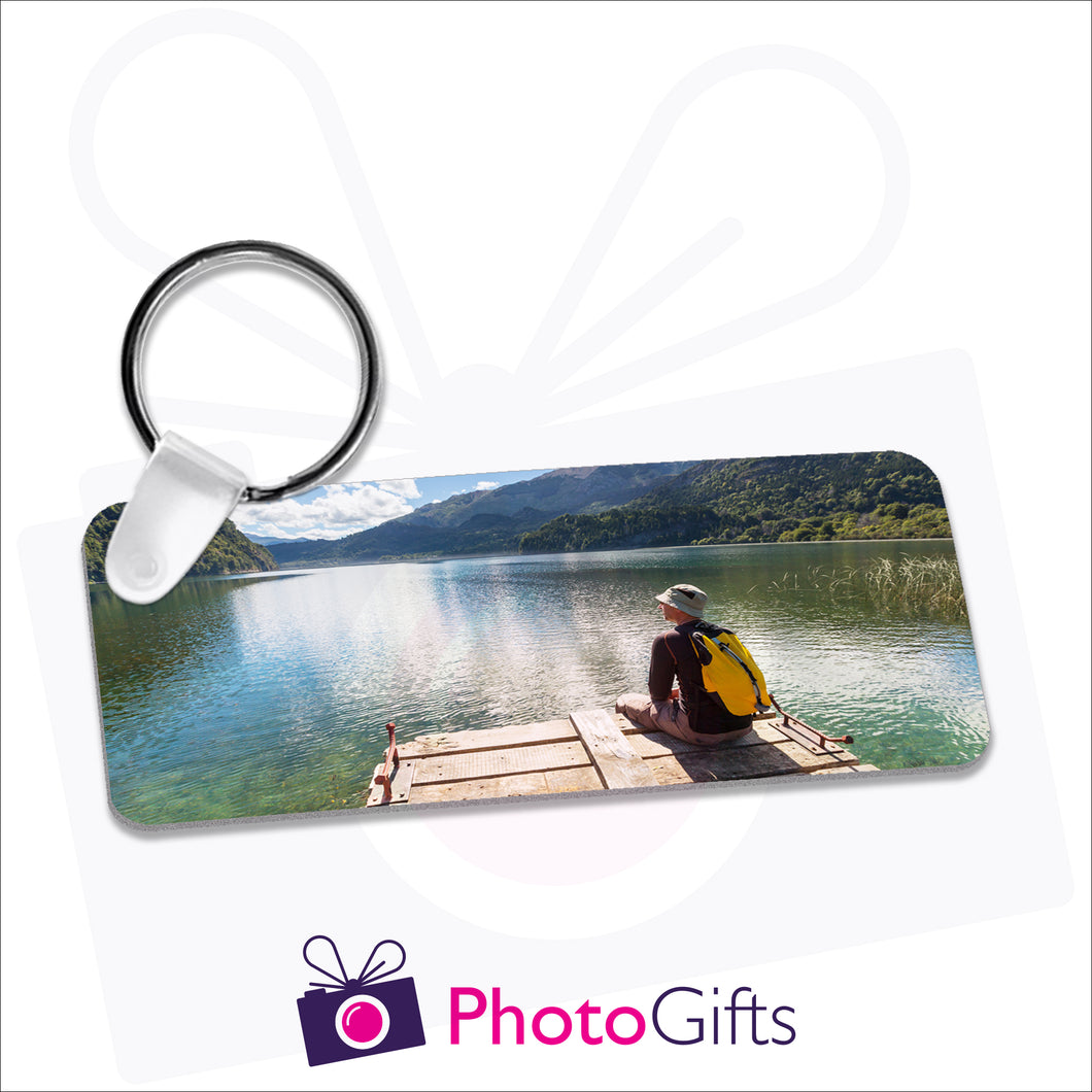 Personalised aluminium rectangular shaped keyring. Your own choice of image is printed on either side.