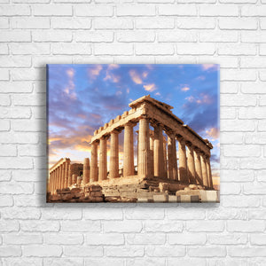 Personalised 20x16" landscape border canvas with your own choice of image hung on a white brick wall by Photogifts.co.uk
