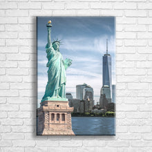 Load image into Gallery viewer, Personalised 24x16&quot; portrait wrapped canvas with your own choice of image hung on a white brick wall by Photogifts.co.uk
