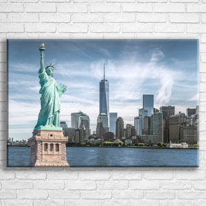 Personalised 30x20" landscape wrapped canvas with your own choice of image hung on a white brick wall by Photogifts.co.uk