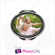 Load image into Gallery viewer, Personalised oval compact mirror with your own choice of image on the front as produced by Photogifts.co.uk
