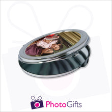 Load image into Gallery viewer, Partially closed personalised oval compact mirror with your own choice of image on the front as produced by Photogifts.co.uk
