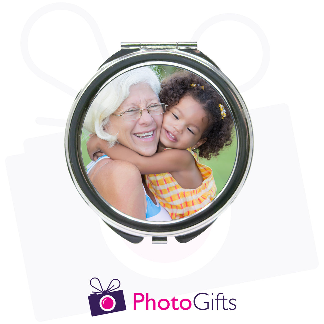 Personalised round compact mirror with your own choice of image on the front as produced by Photogifts.co.uk