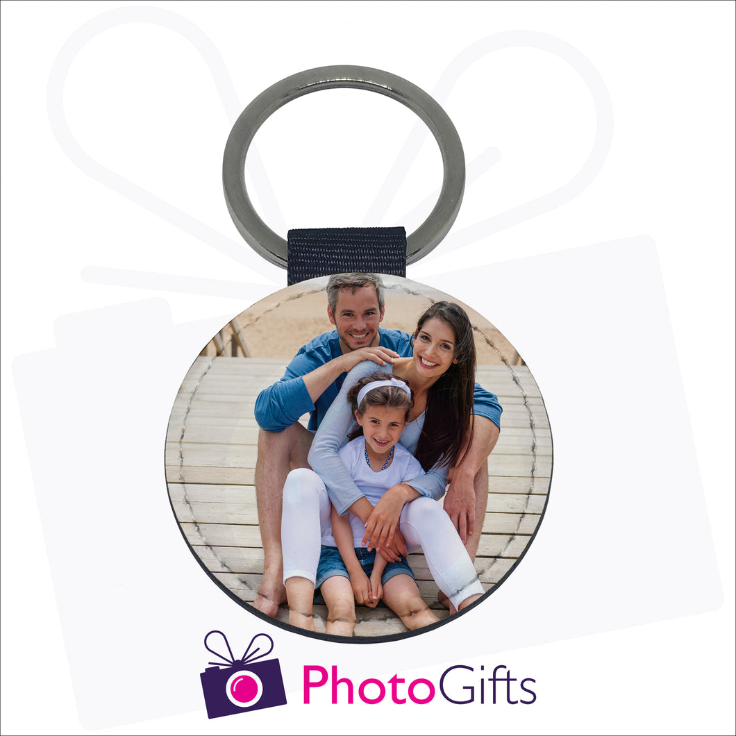 Round faux leather double sided keyring with your own choice of image on both sides as produced by Photogifts.co.uk