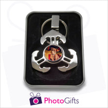 Load image into Gallery viewer, Anchor style fidget spinner on keyring in gift tin as supplied by Photogifts.co.uk. Your choice of image is printed on the middle part of the spinner.
