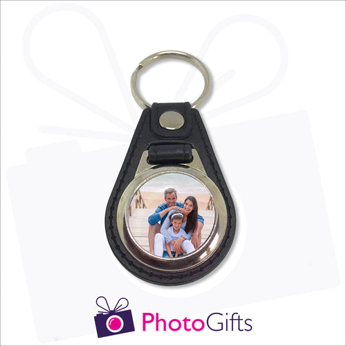 Traditional leather keyfob style with your own choice of image printed on one side. Image is round in shape and in a small metal frame.