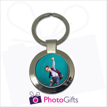 Load image into Gallery viewer, Round metal pendant keyring with your own choice of image in the centre as produced by Photogifts.co.uk
