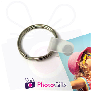 Close up of clasp and ring from personalised plastic keyring as produced by Photogifts.co.uk