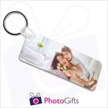 Load image into Gallery viewer, Double sided plastic keyring in a rectangular shape with your own choice of image on both sides as produced by Photogifts.co.uk
