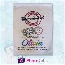 Load image into Gallery viewer, Blue snowy background with snowman with large white sack with the words &quot;Express delivery from the north pole DO not open before 25 December Please delivery enclosed presents to Olivia if undelivered return to Santa Claus North Pole&quot; by Photogifts.co.uk
