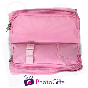 Inside detail of pink personalised vanity case showing two zipped pockets and mini pocket as produced by Photogifts.co.uk